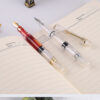 IMG_7838.jpg 教师专用大容量透明红笔|活塞吸墨批改作业钢笔 / Teacher's Large-Capacity Transparent Red Fountain Pen | Piston Ink Filling for Grading